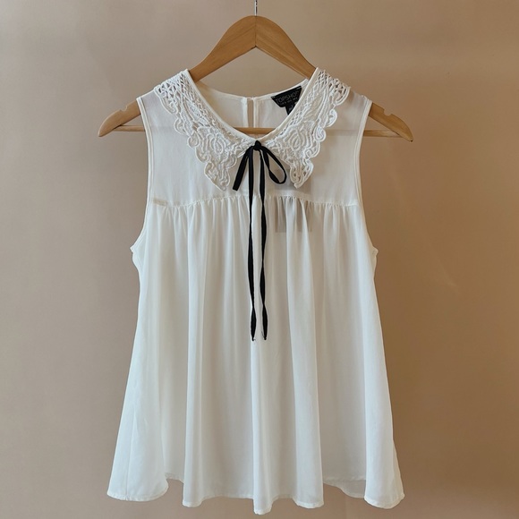 Coquette Bow Tie Sleeveless White Blouse - Picture 1 of 3